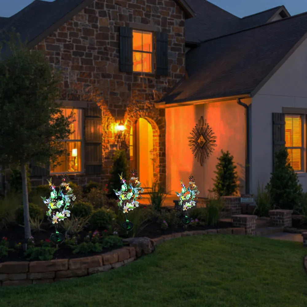 Solar-powered cherry blossom garden light with ground stake