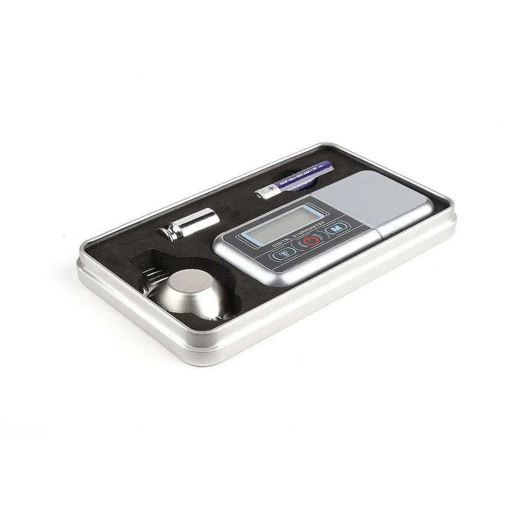Digital electronic weighing scale with LCD display showing 0.000g, 100g maximum capacity for jewellery and materials