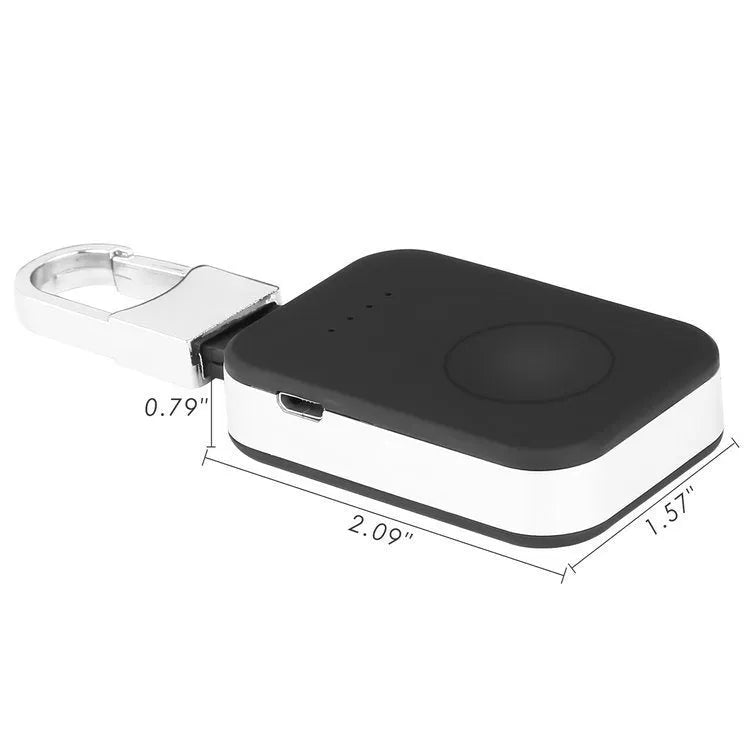 Black Apple Watch portable power bank keychain charger with USB port shown next to an Apple Watch.