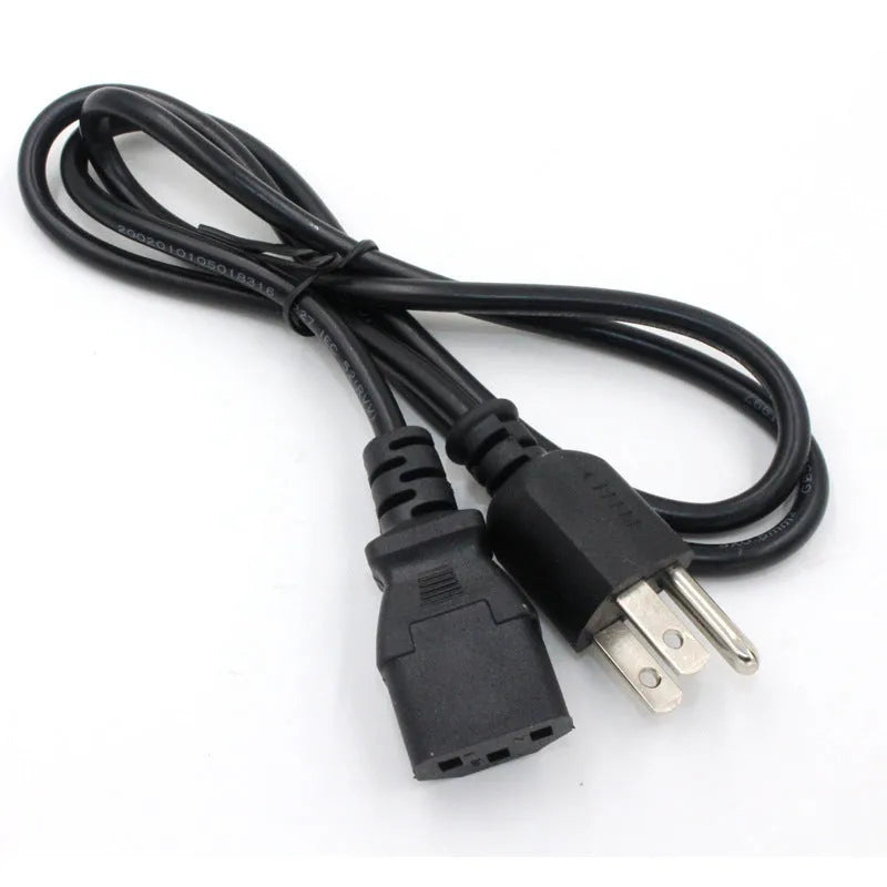 Black American standard three-pin power cord showing plug and 1.2 metre PVC-sheathed cable