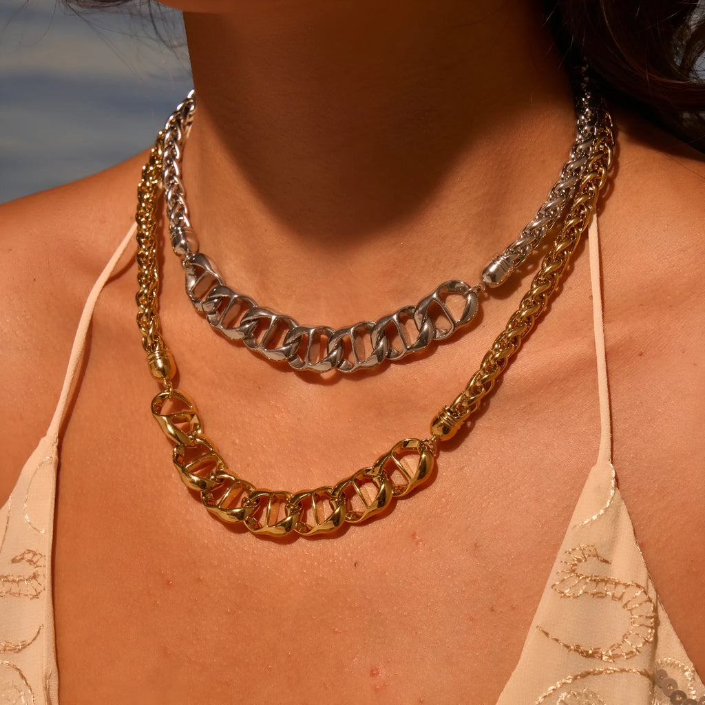 Stainless steel geometric pendant necklace with gold electroplating on regular chain