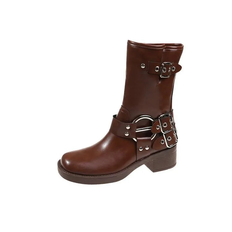 Black women's platform boots with a silver metal buckle strap on the ankle.