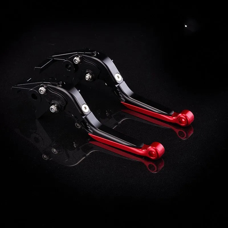Pair of anodised metal motorcycle brake and clutch levers with adjustable length mechanism