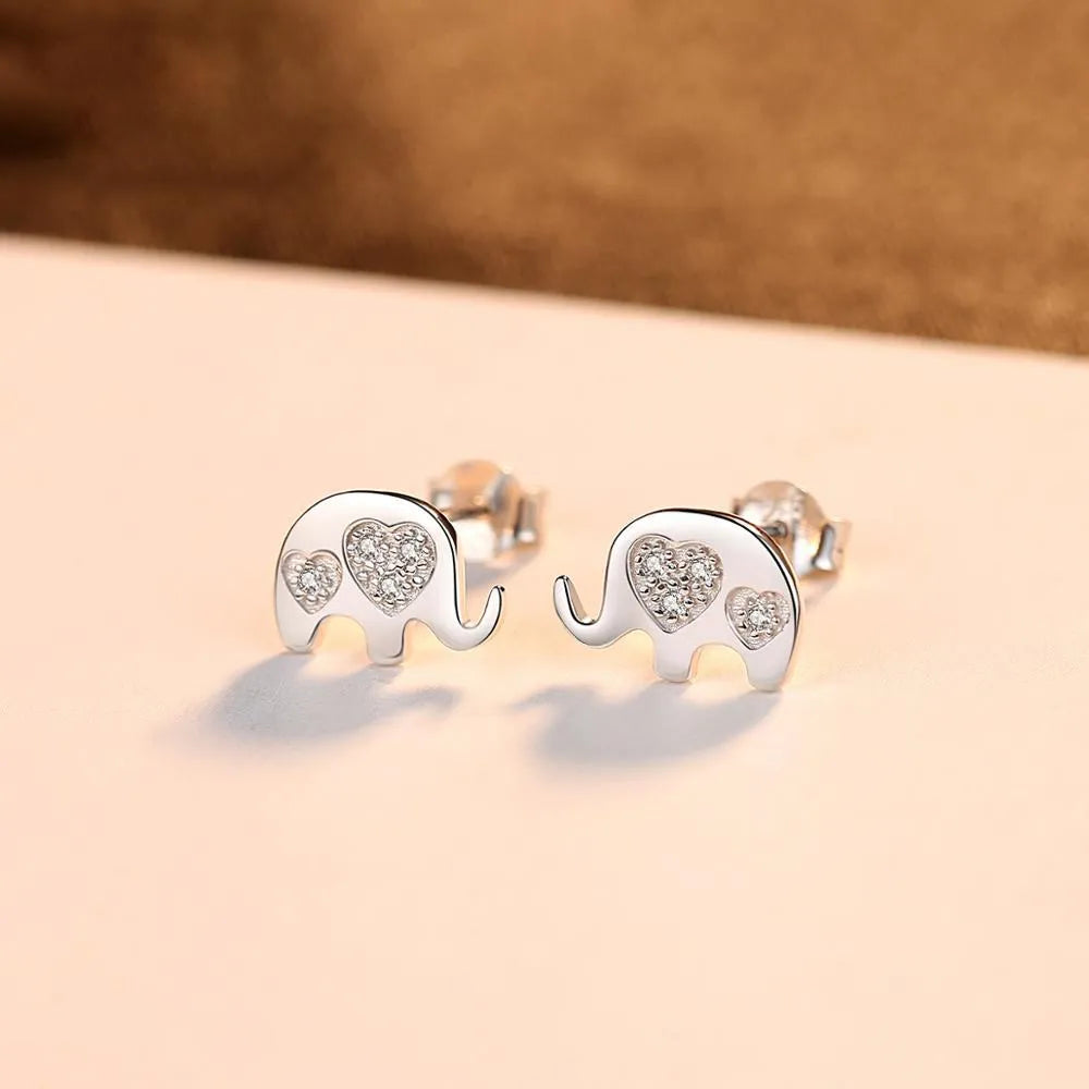 Geometric Korean silver earrings with gem setting measuring 0.6cm by 0.9cm in gold or silvery colour