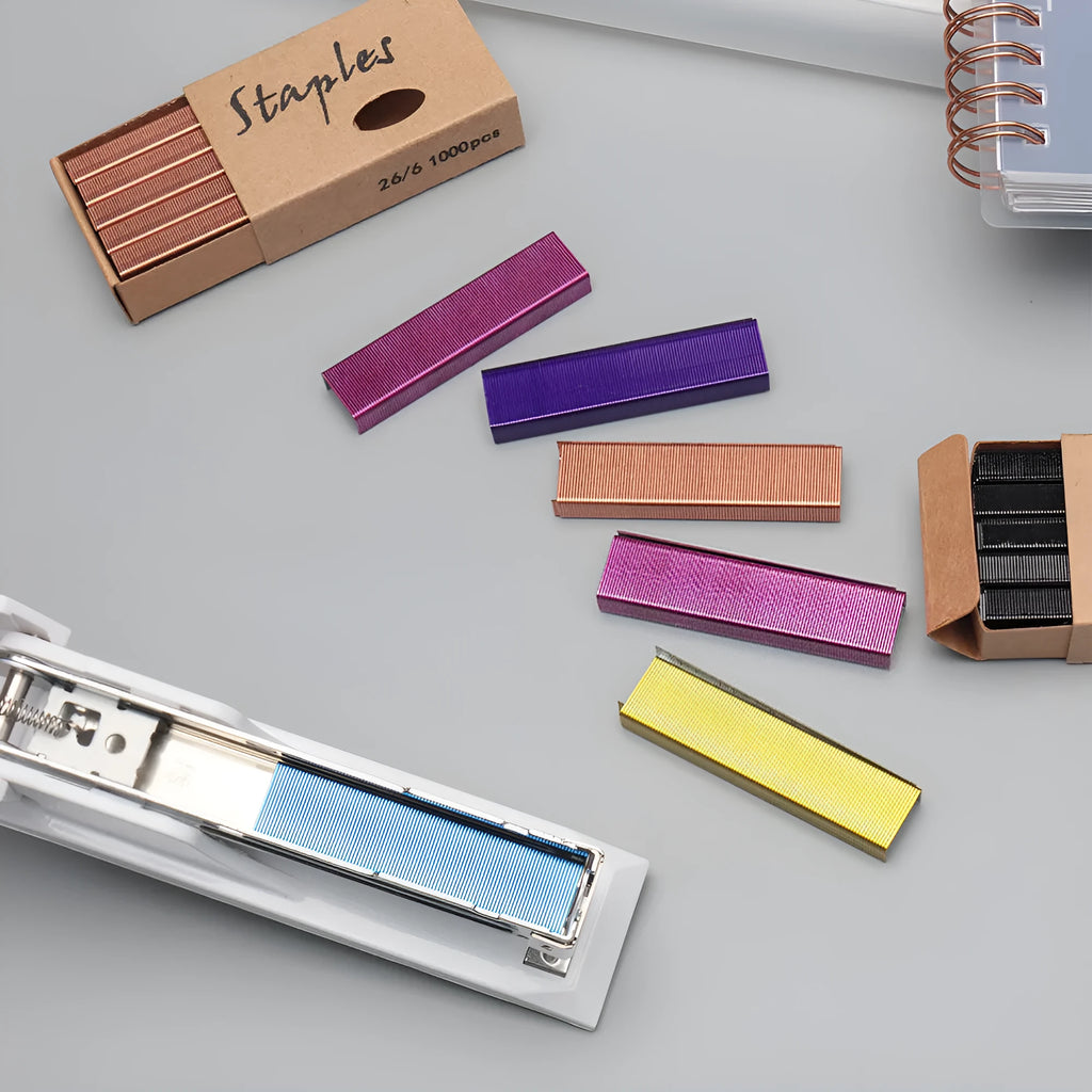 Box of 1000 metal stapling needles in rose gold, black, purple, and rose red colour options.