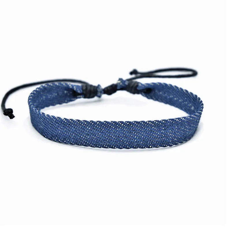 Handmade denim fabric bracelet strap for travel memories, shown in one of eleven colour variants