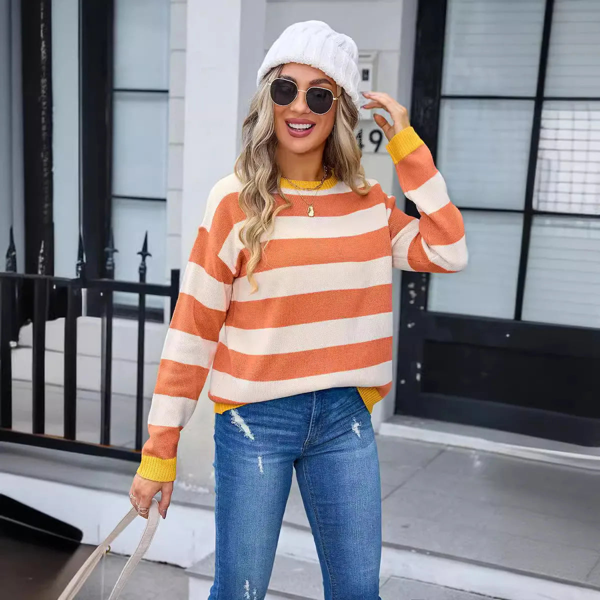 Women's loose fit acrylic flower pattern long sleeve sweater in blue colour with round neckline