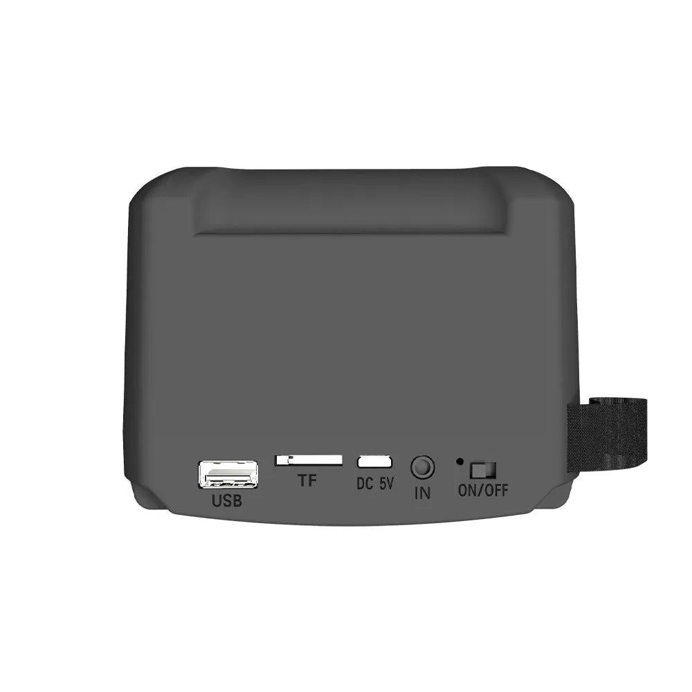 Portable Bluetooth speaker with USB charging cable and compact radio-style design