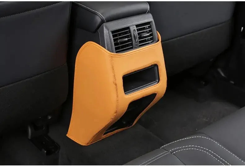 Set of three leather anti-kick pads for 2023 Mitsubishi Outlander seat and door armrest protection.