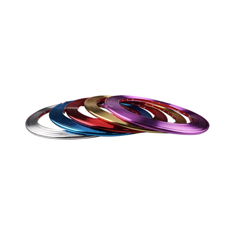 Roll of electroplated purple PVC wheel hub trim strip, 8 metres long, for car decoration and protection.