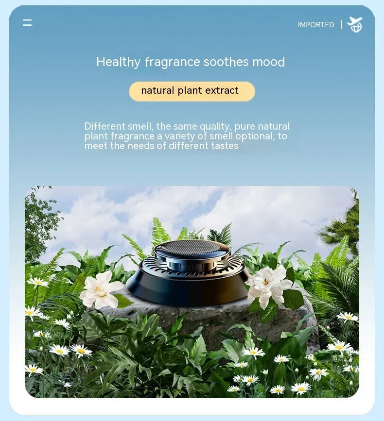Solar-powered kinetic car air freshener with rotating double rings on car dashboard