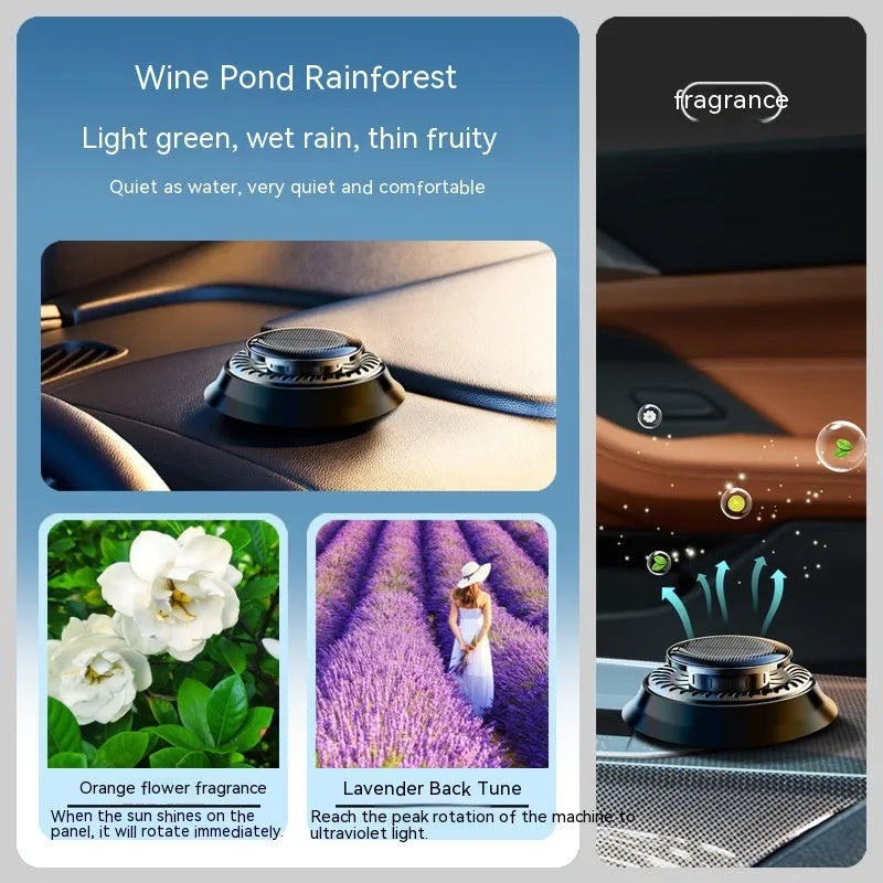 Solar-powered kinetic car air freshener with rotating double rings on car dashboard