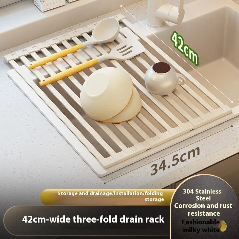 Foldable stainless steel kitchen draining rack in milky white finish showing tri-fold mechanism