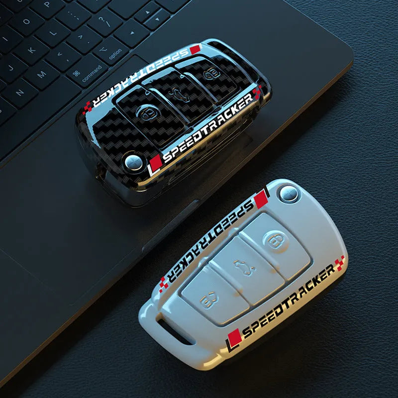 Carbon fibre style car key cover with mirrored finish in white and carbon colour options