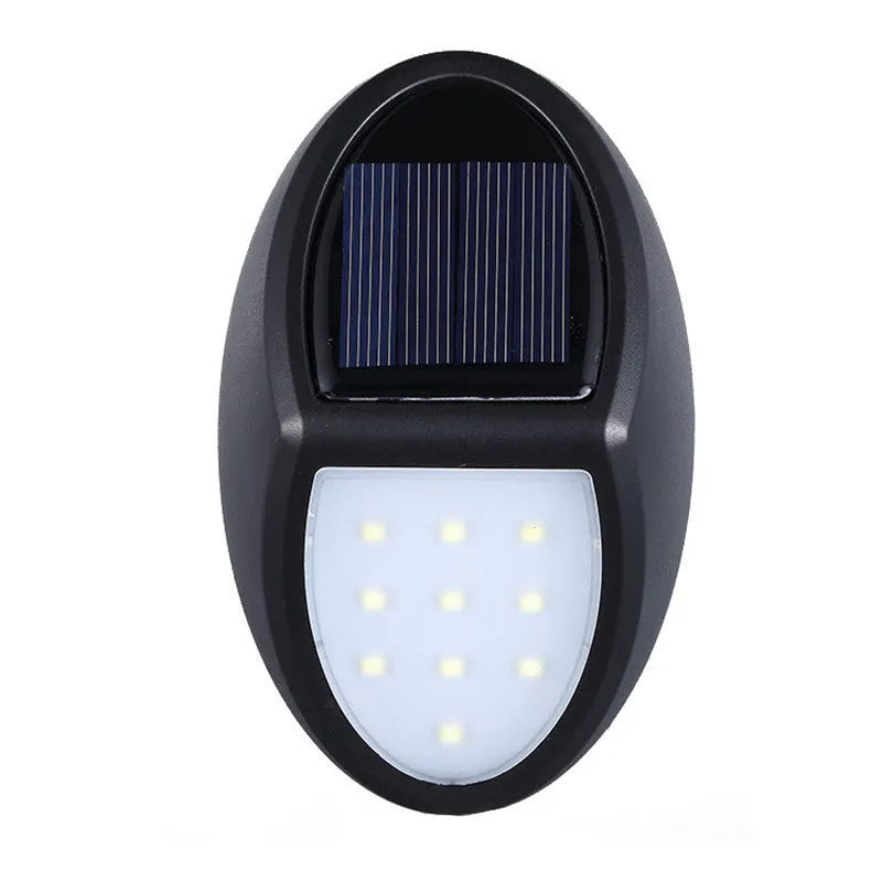 Black solar-powered LED wall light with automatic sensor measuring 75mm by 120mm