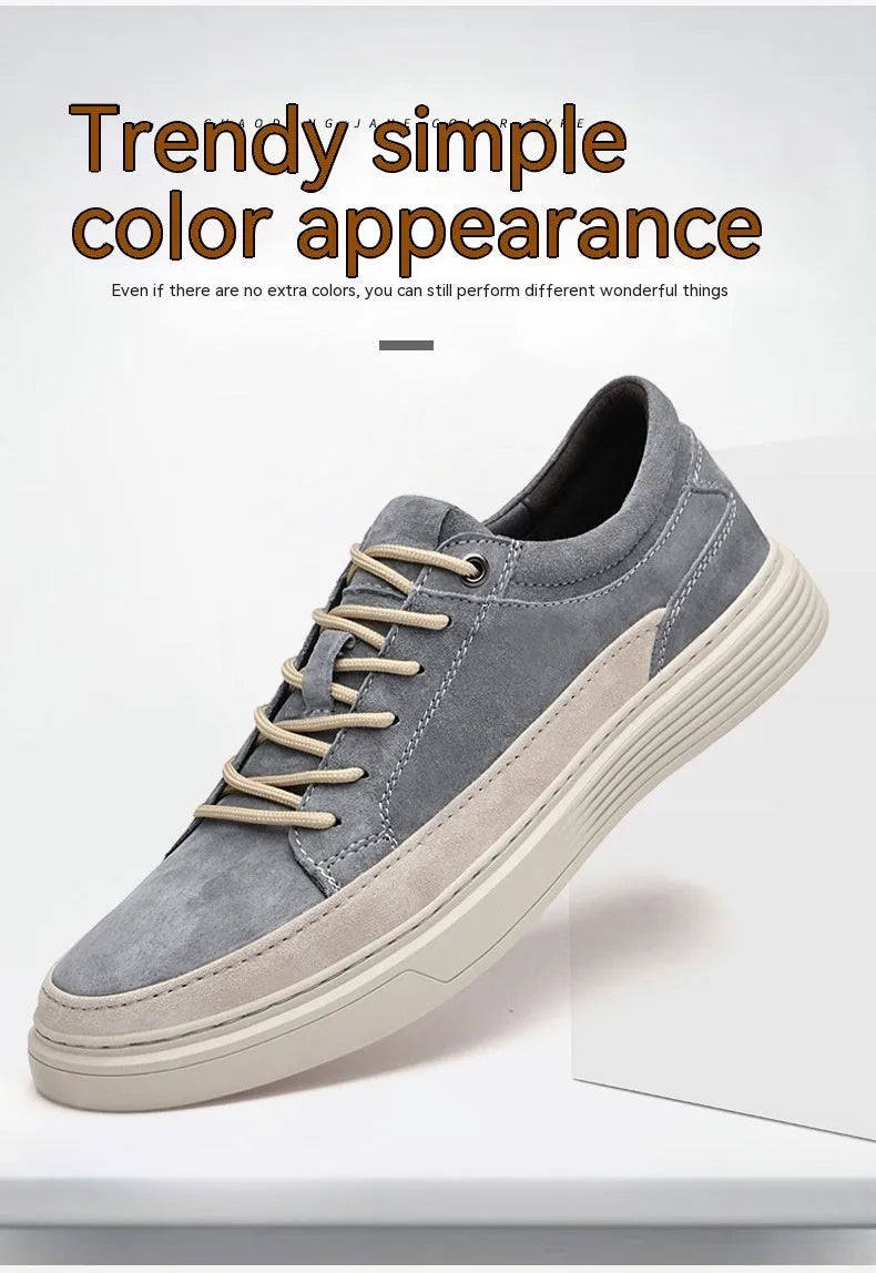 Men's gray casual skate shoes with pigskin leather upper and rubber sole on a white background.