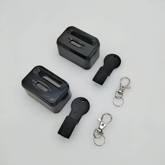 Black and red plastic seat belt buckle clamp holders for automotive use
