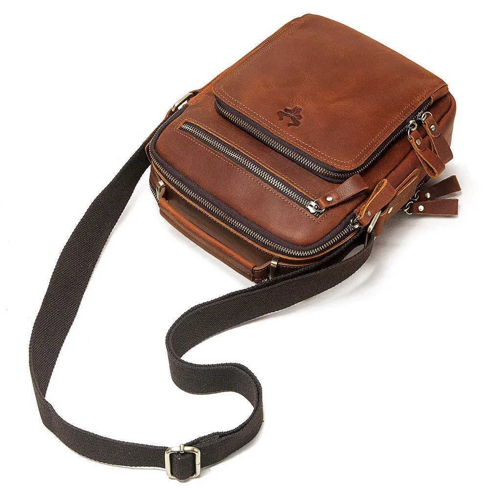 Men's brown leather crossbody bag with single-shoulder design showing sewing line details and business travel style