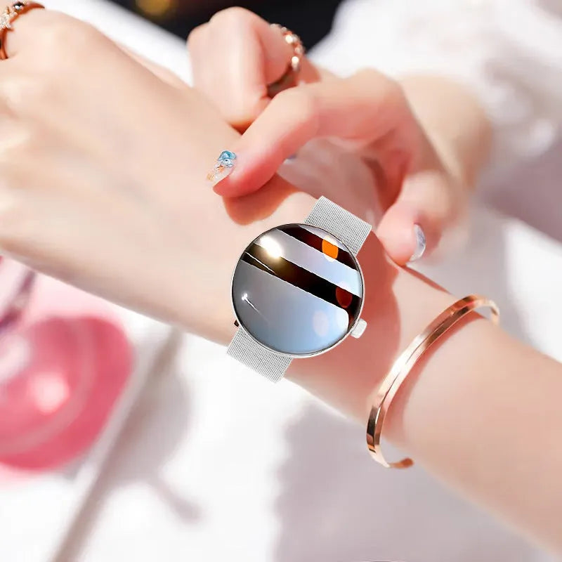 Women's smart watch with circular colour screen and metal strap in black, gold, or silver steel options