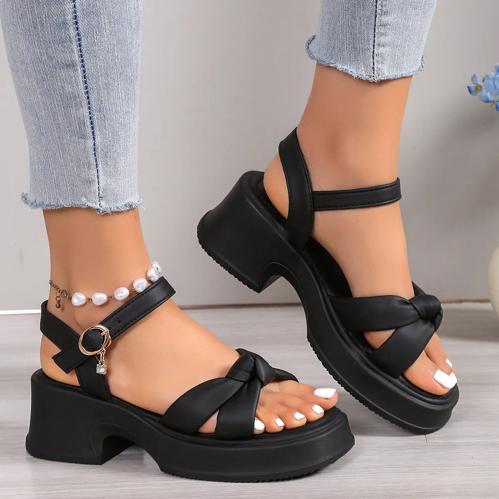 Black women's high heel slippers with thick rubber sole and button fastening