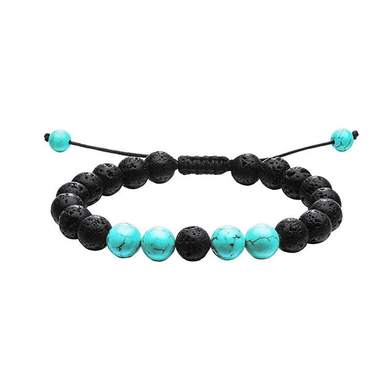 Geometric couple bracelet made of matte black agate beads with a tiger eye stone.