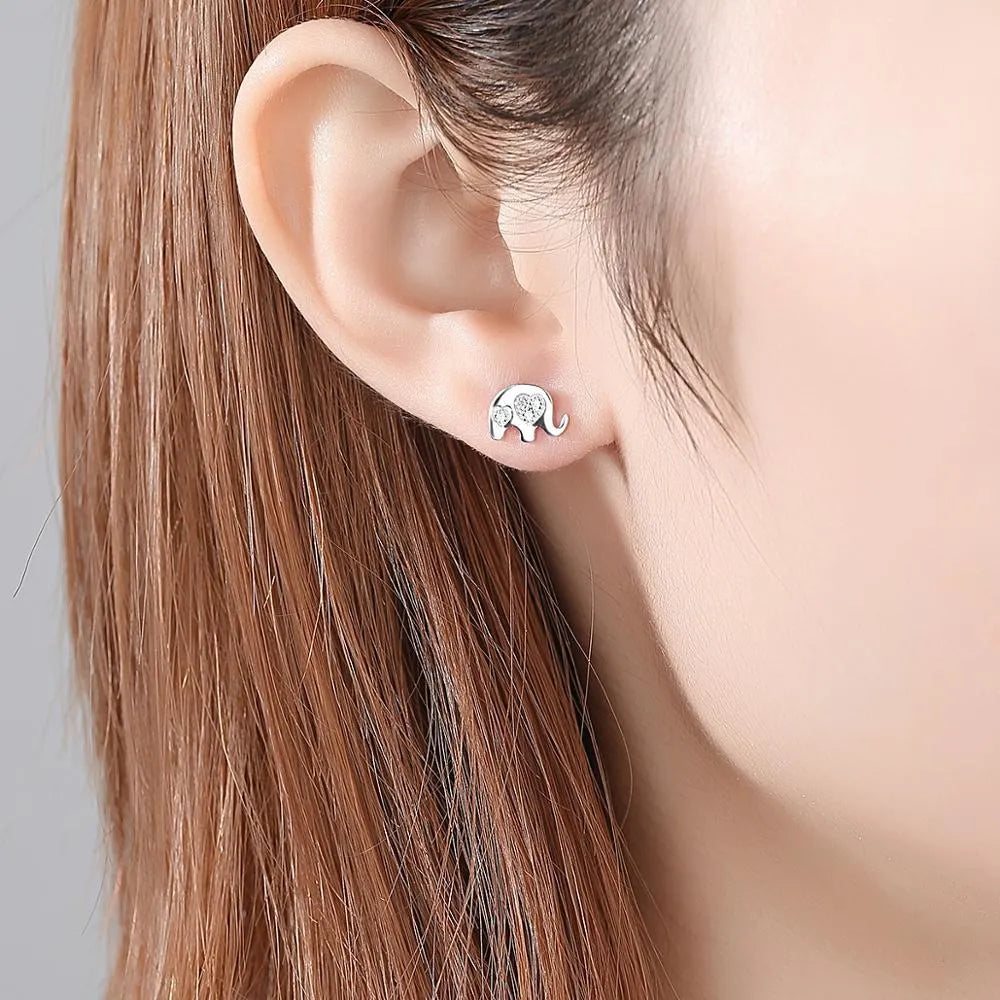 Geometric Korean silver earrings with gem setting measuring 0.6cm by 0.9cm in gold or silvery colour