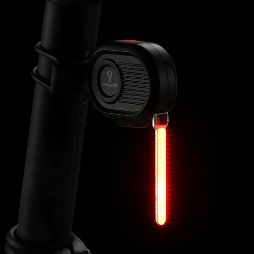 Bicycle rear safety light with colourful waterfall LED effect, showing Type-C charging port.