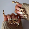 Leopard print butterfly plastic nail decorations WM296 colour set for fingernails