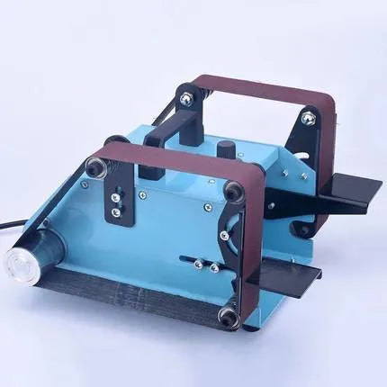 Blue desktop dual-axis belt sander with a 750W motor and variable speed control for sharpening and polishing.