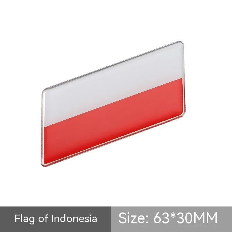 Aluminium parallelogram car sticker with national flag design measuring 6.3 by 3 cm