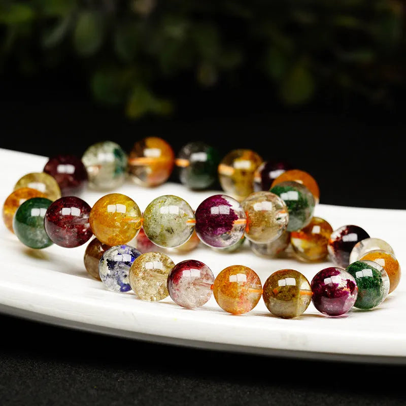 Crystal bracelet with colourful cornucopia design and retro ethnic styling on wrist