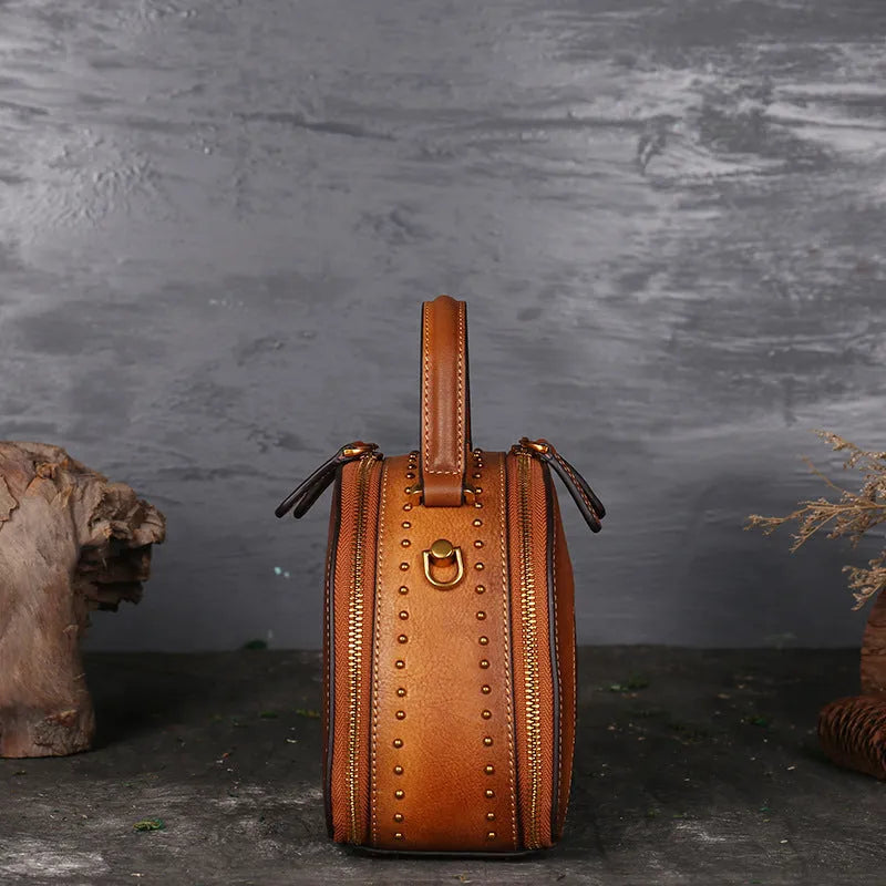 Vintage suede leather handbag in Bean Shahong colour showing internal ID pocket and mobile phone compartment.