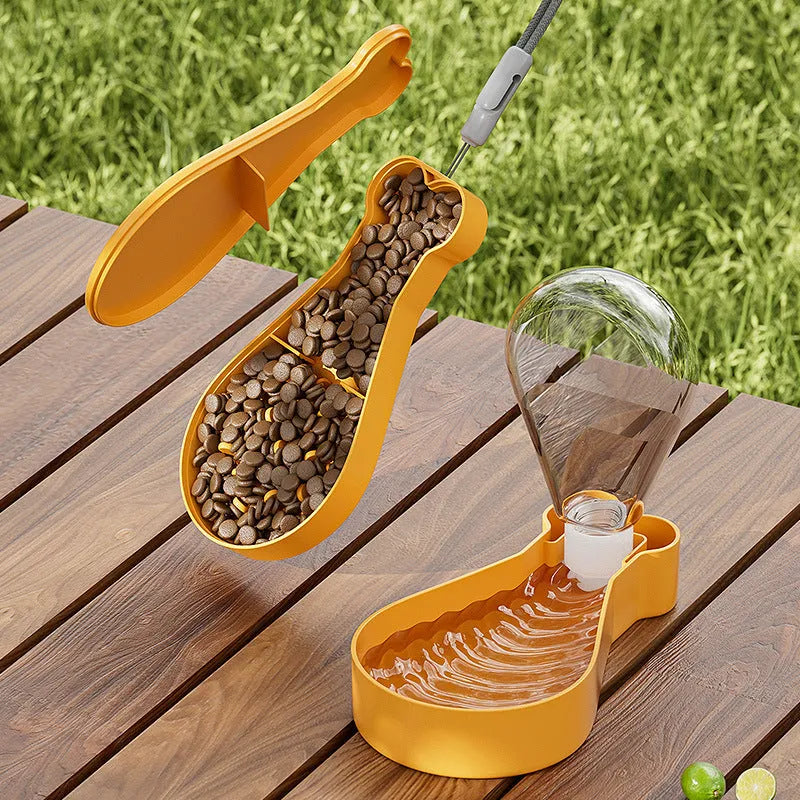 Orange and white portable pet water feeder with food container for dogs and cats outdoor use