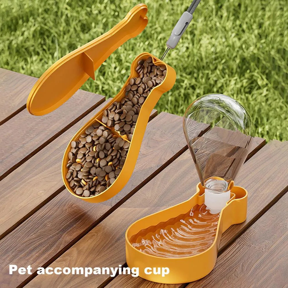 Orange and white portable pet water feeder with food container for dogs and cats outdoor use
