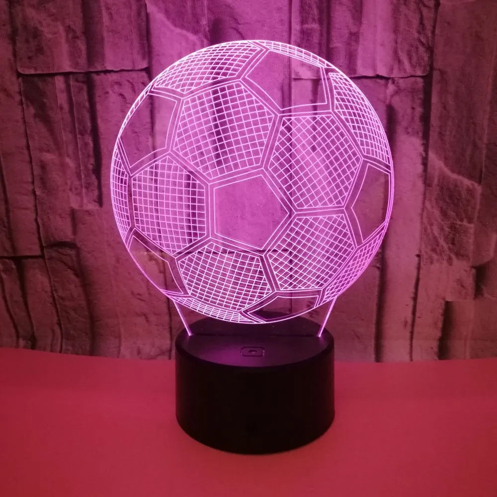 3D acrylic football night light showing red LED colour, with USB cable and remote control.