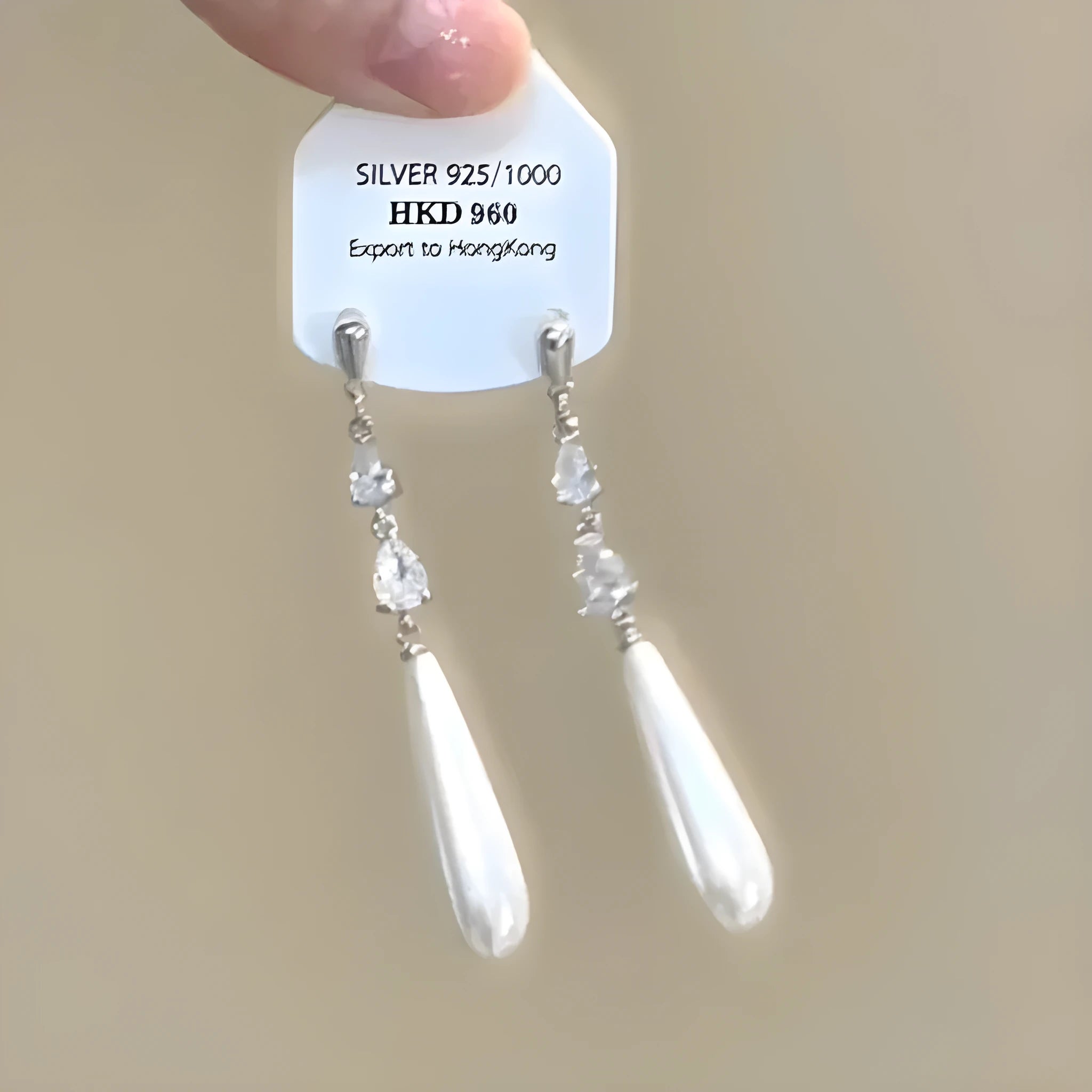 Geometric heart-shaped alloy ear clips with rhinestone and star tassel decorations in gold tone finish