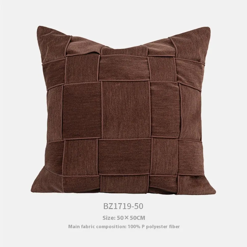 Chenille woven square pillow cushion in beige colour on a sofa