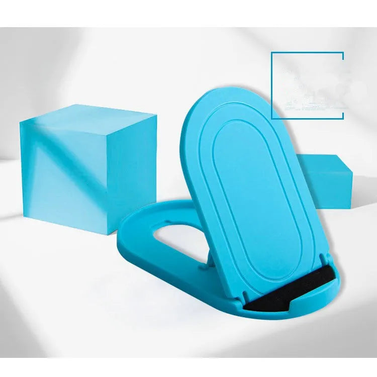 A lazy bracket style mobile phone stand made of plastic, shown in multiple colour options on a wooden desk.