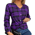 Women's purple loose fit plaid shirt with regular sleeves on a hanger.