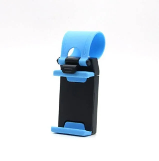 Black steering wheel phone holder clip mounted on car steering wheel holding a smartphone
