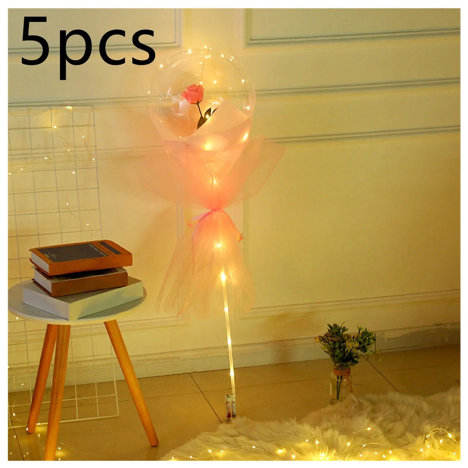 Transparent LED luminous balloon bouquet with artificial rose and glowing light inside, displayed as a DIY kit.