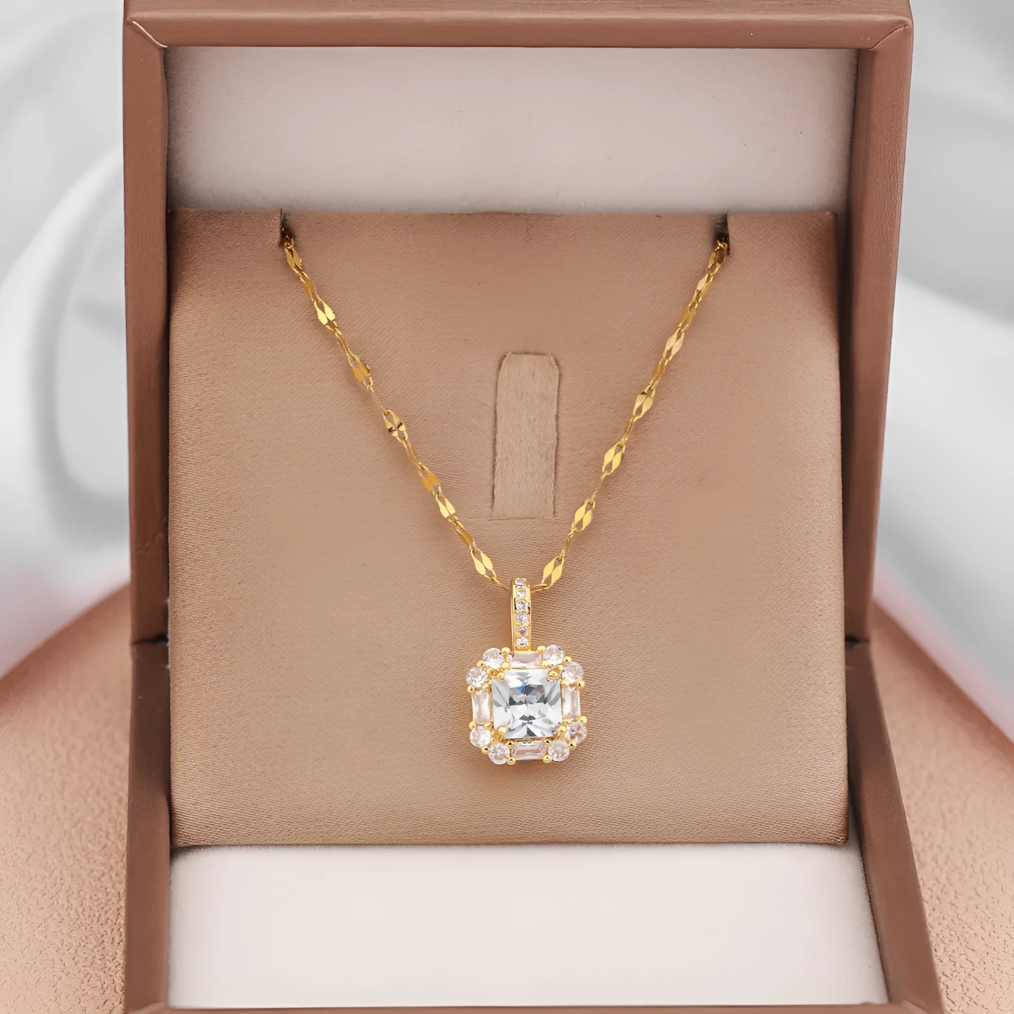 Gold titanium steel clavicle chain with geometric zircon inlaid pendant on water wave chain