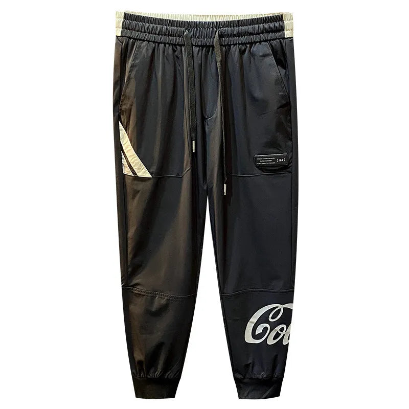 Black men's ultra-thin cotton cropped trousers with elasticated ankle banding.