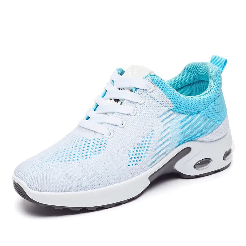 Women's pink Flyknit casual running shoes with mesh lining and flat heel on a white background