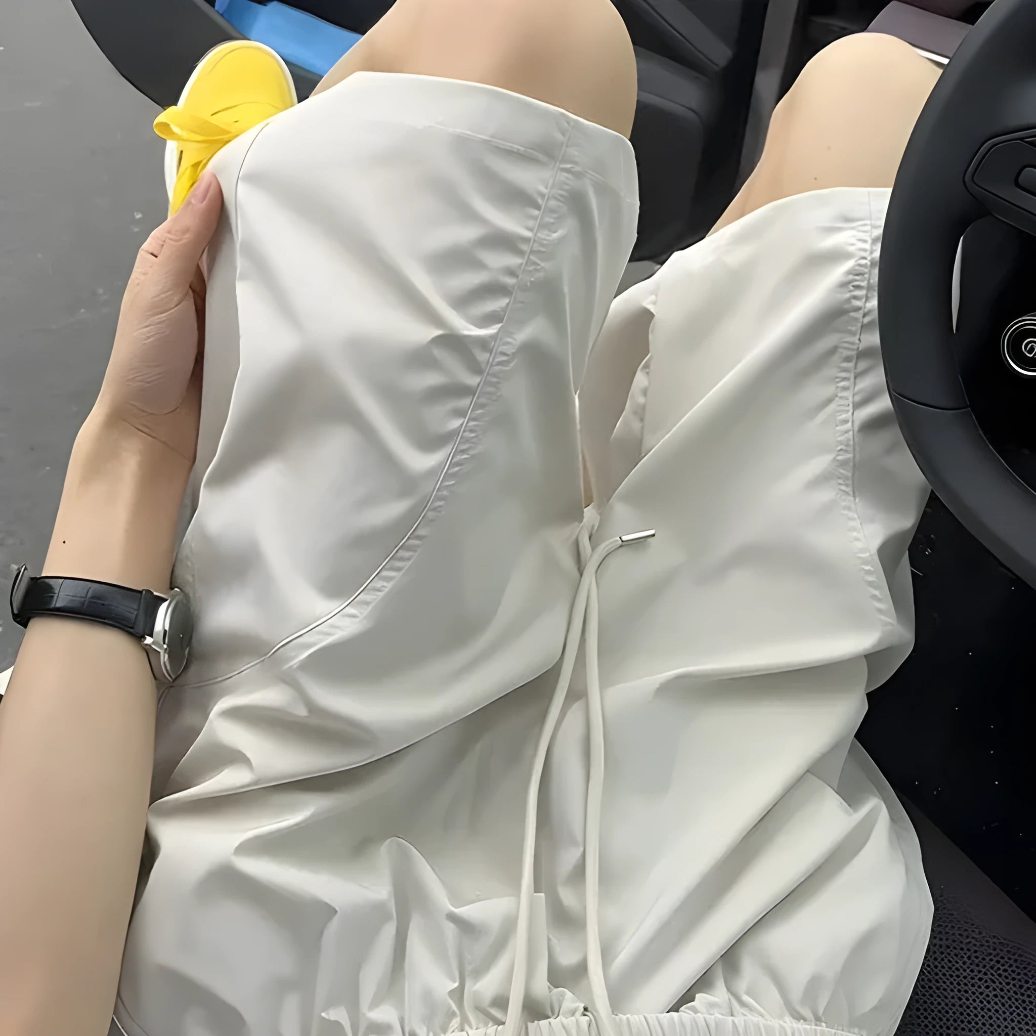 Men's beige quick-drying polyester sports shorts with a straight leg and elastic waistband.
