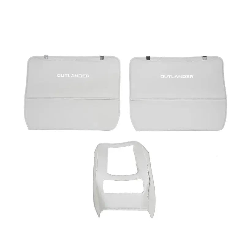 Set of three leather anti-kick pads for 2023 Mitsubishi Outlander seat and door armrest protection.