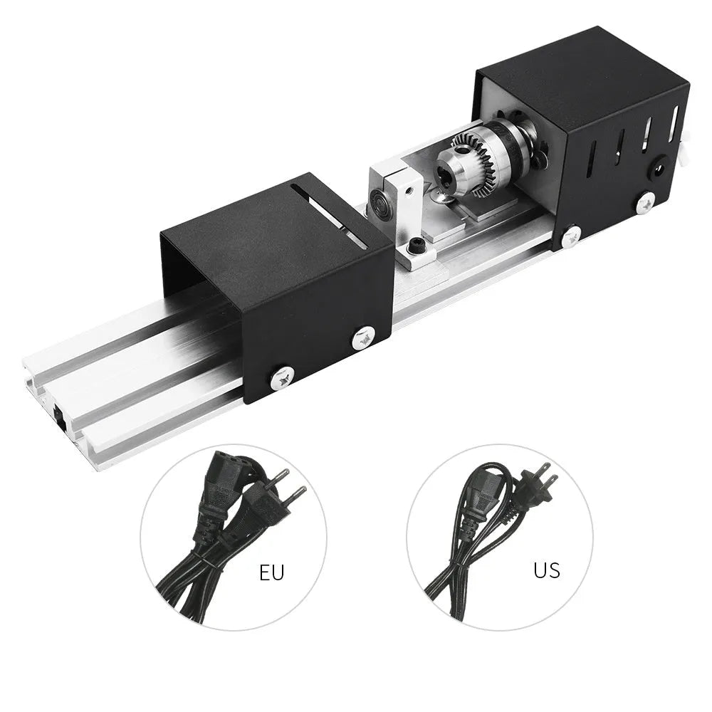 Silver metal mini woodworking lathe with carving knives on a workbench