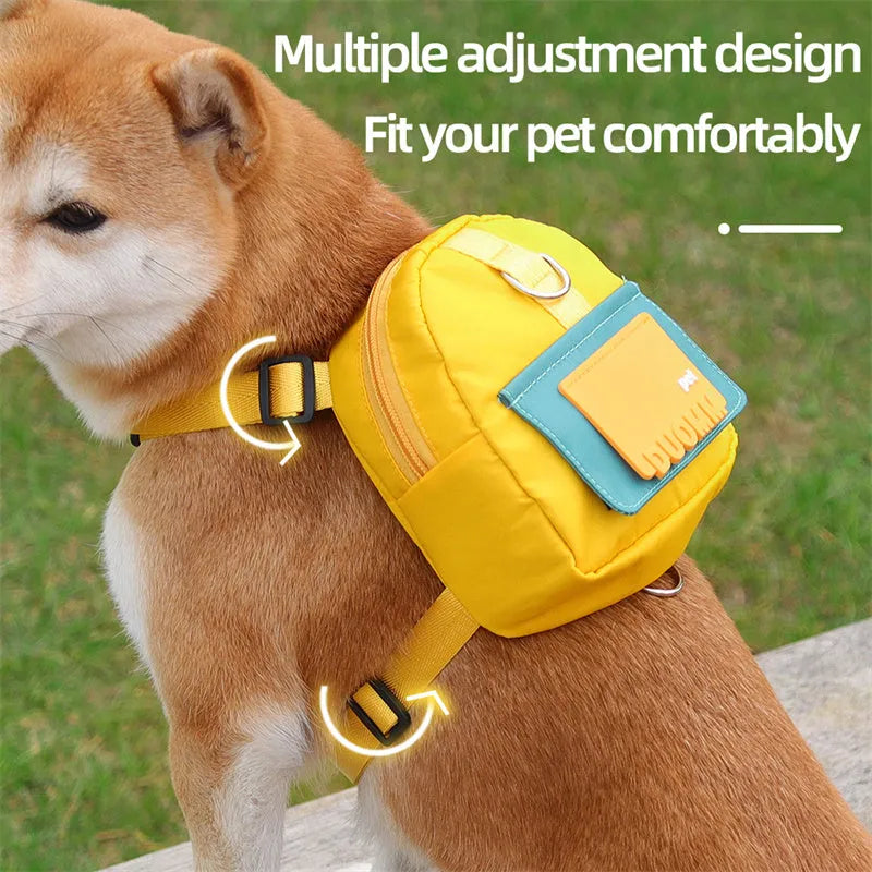Blue adjustable dog backpack harness with storage compartments and breathable mesh panels