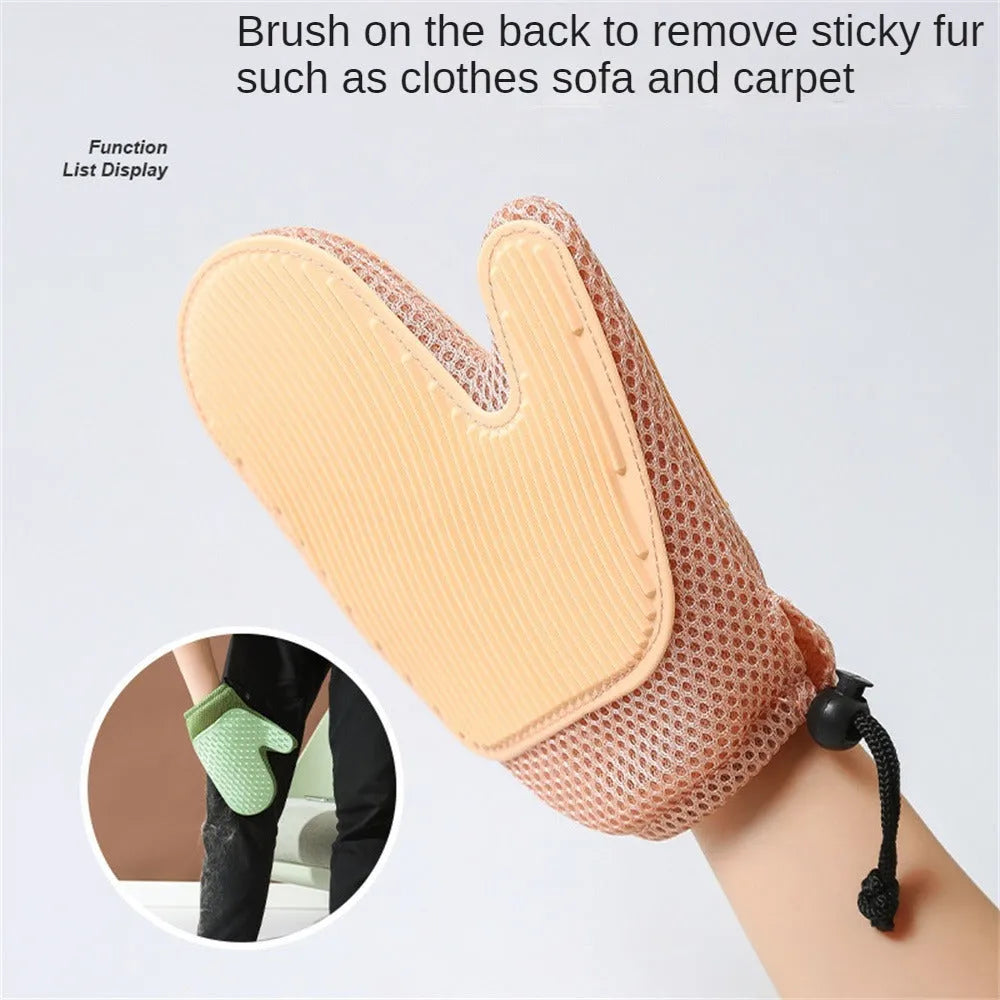 Dark blue pet hair removal glove made of mesh and TPR rubber for grooming dogs and cats.
