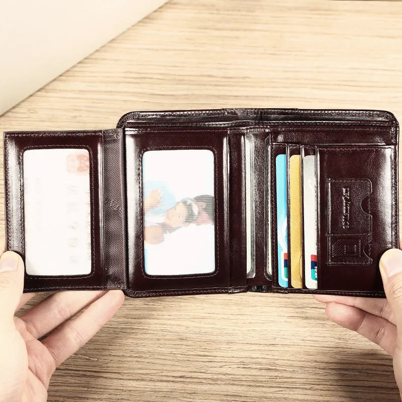 Men's leather wallet showing internal card slots, coin compartment, and document section